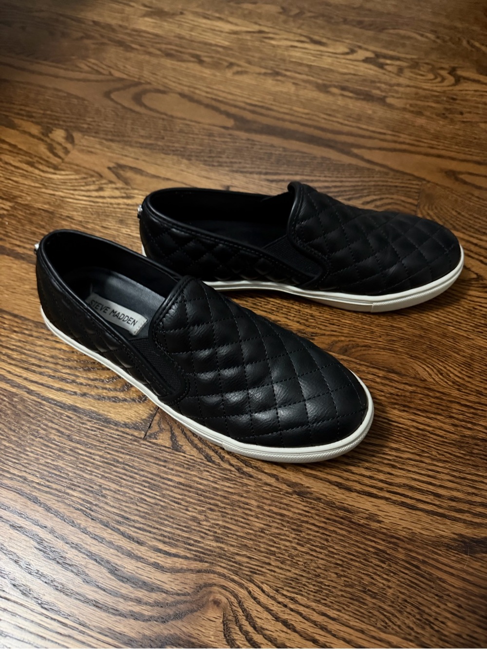 Steve Madden Black Quilted Slip-On Sneakers with White Sole